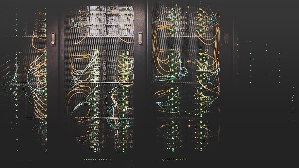 Racks of critical building infrastructure with glowing status indicators