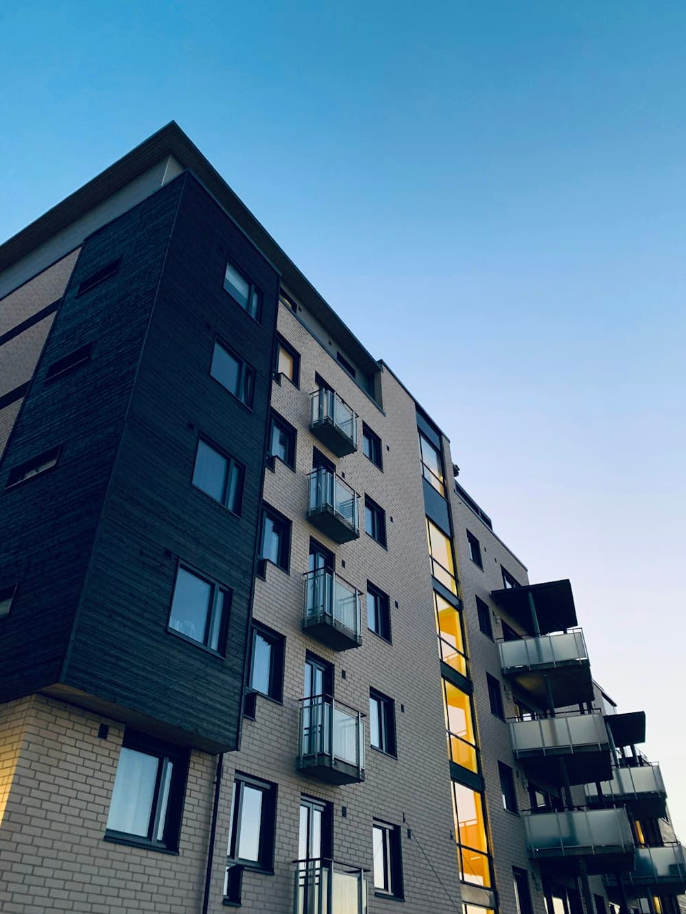 Modern residential apartment community at dusk
